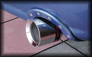 Close Up of New A4 8E USA OEM Bumper Exhaust Collar from UBERHÄUS in MatchPaint Denim Blue