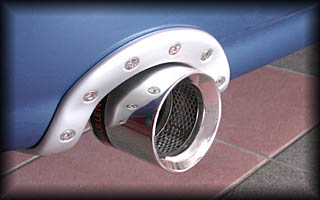 Close Up of New A4 8E USA OEM Bumper Exhaust Collar from UBERHÄUS in RS Silver